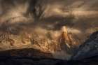 Before the storm covers the mountains spikes Art Print by Peter Svoboda