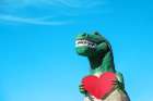 Tyrannosaurus Rex with a Red Paper Heart Art Print