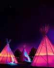 Vaporwave Teepees Glowing at Night Under Stars In Marfa Texas Art Print