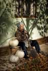 Old woman with pumpkins Art Print
