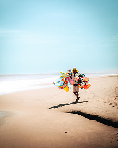 Colorful Beach Vendor Art Print by Monica Galvez