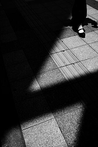 Street Shadow Stride Art Print by Kazutaka Niigata