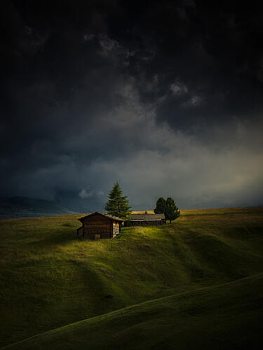 Secluded Huts Stormy Sky Art Print