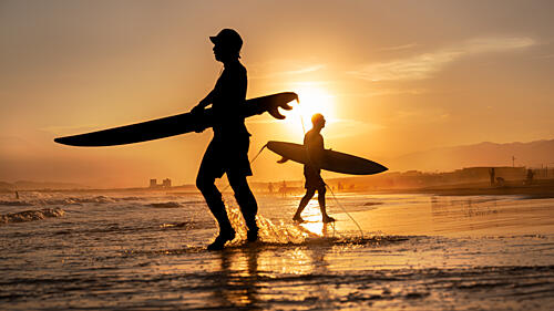 Sunset Beach Surfers Art Print by Sato Shin