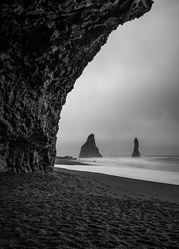 Black Sand Sea Stacks Art Print by Isam Telhami