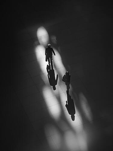 Urban Walk in Shadows Art Print by Ikumi Fukazawa