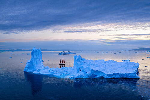 Red Sailboat Among Icebergs Art Print