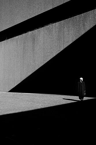 Urban Shadow Walker Art Print by Fabio Montalto