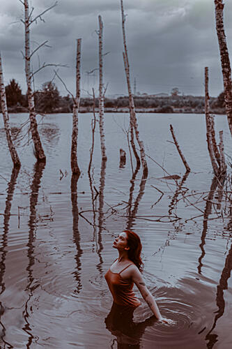 Woman in Moody Water Art Print