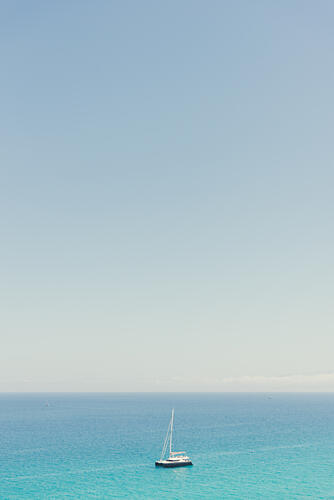 Sailboat on Blue Ocean Art Print