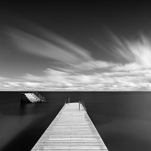 Dark Water Pier Steps Art Print by Ralf Steinberg
