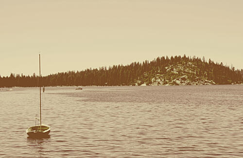 Serene Lake Sailboat Art Print