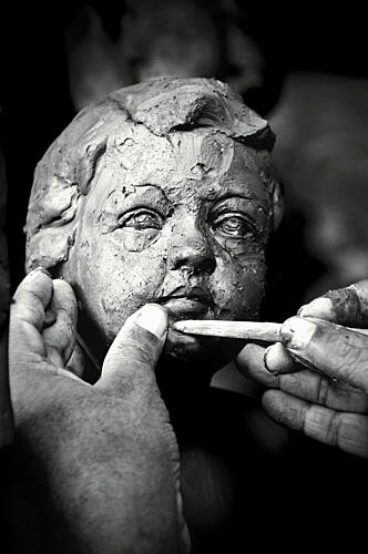 Artist Sculpting Young Face Art Print