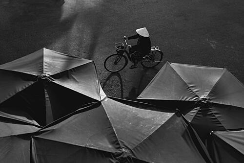 Conical Hat Cyclist Art Print by Nguyen an di