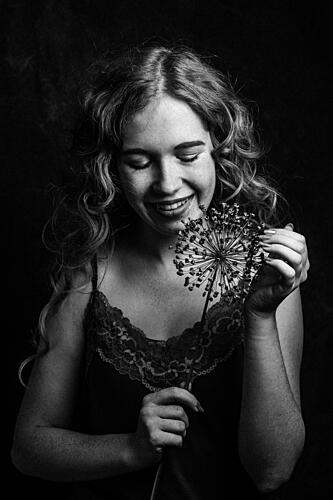 Smiling Woman with Flower Art Print