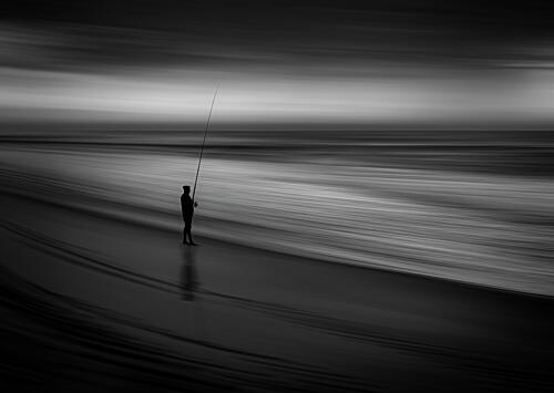 Moody Beach Angler Art Print by Hein Jonker