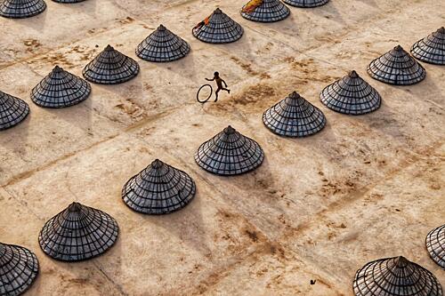 Playing Among Conical Shapes Art Print by Washiful Majid