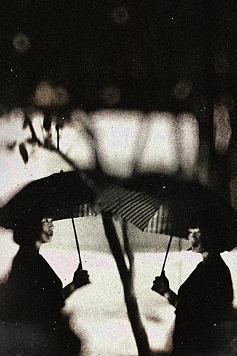 Women with Umbrellas Art Print