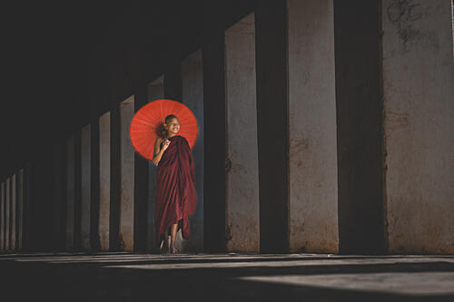 Buddhist Monk Red Parasol Art Print by Samim Ada