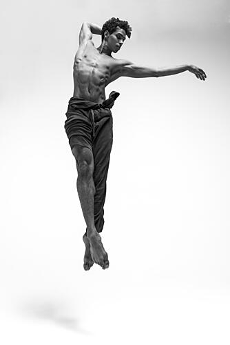 Graceful Dancers Leap Art Print