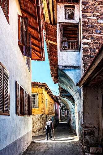 Sunlit Village Alley Art Print by Zafer Cankiri