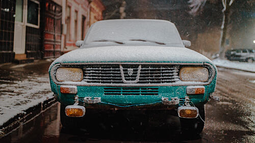Snowy Vintage Car Art Print by Sorin Mosescu