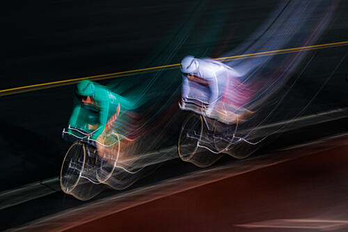 Blurred Cyclists Racing Art Print by Unknown
