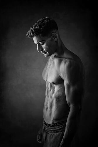 Pensive Muscular Man Art Print by Irene Wu