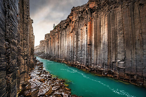 Basalt Canyon River Flow Art Print by Marc van Oostrum