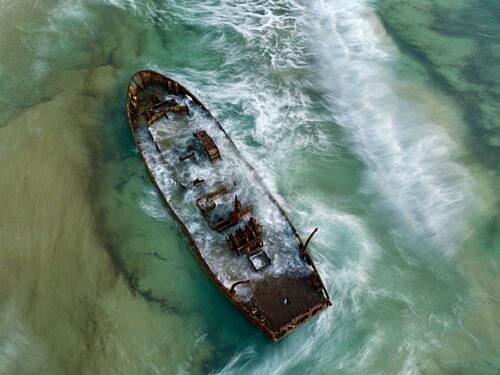 Rusty Shipwreck Coastline Art Print by eMunther