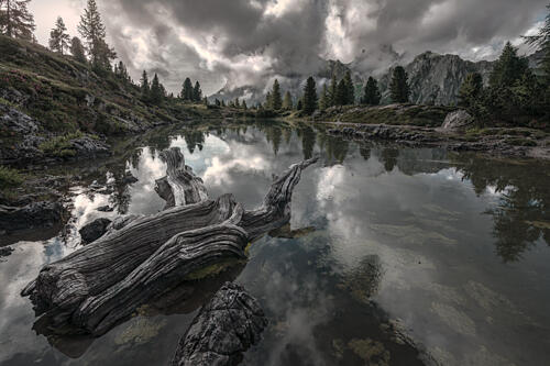 Moody Mountain Lake Art Print by Stefano Caccia