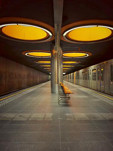 Orange Lit Metro Station Art Print by Frank Bruynseraede