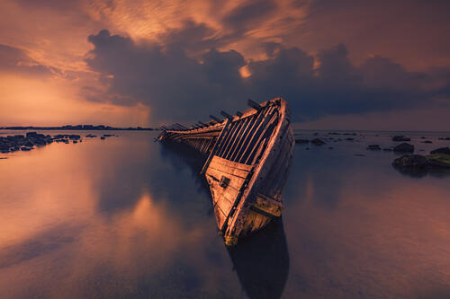 Abandoned Shipwreck Sunset Art Print by Bunyamin Wari