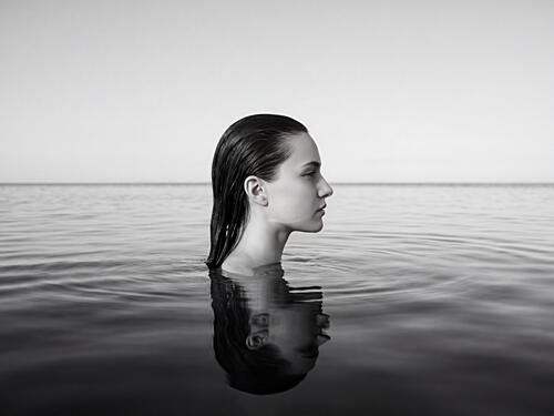Woman in Water Reflection Art Print