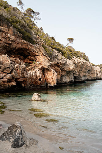 Serene Coastal Cove Art Print by Henrike Schenk