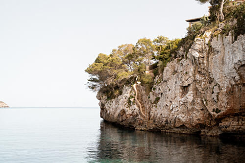 Mediterranean Cliffside Escape Art Print by Henrike Schenk