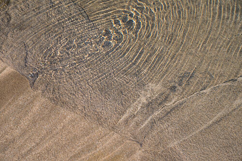 Sunlit Sand Ripples Art Print by Photolovers