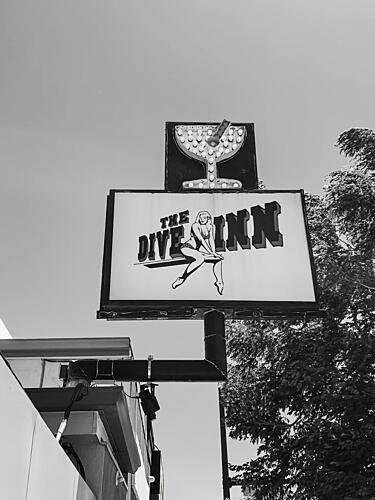 Vintage Dive Inn Sign Art Print by del Mundo Imagery