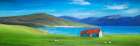Scottish Highlands with a Little Red Roof House Art Print