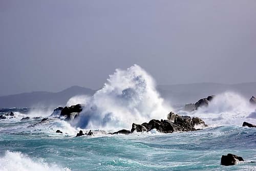 Waves broken by the rocks Art Print