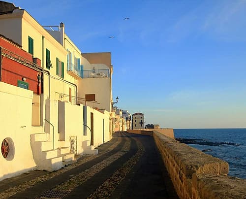 Relaxing walk on Alghero Bastions with sea view and seagulls Art Print by Saiu Giovanni