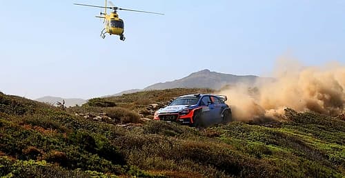 Rally in the sardinian countryside with helicopter Art Print by Saiu Giovanni
