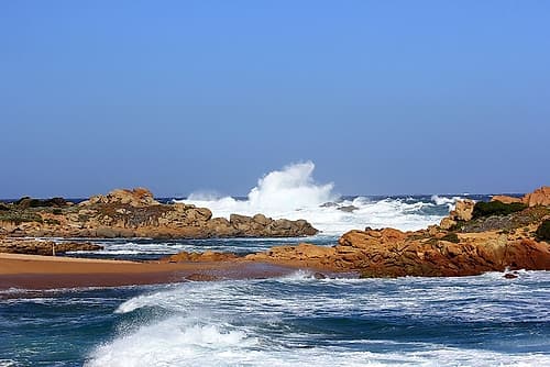 Stunning waves crashing on rock in sardinia island Coastal Print