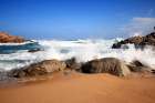 Stately Waves Crashing on red rocks Art Print