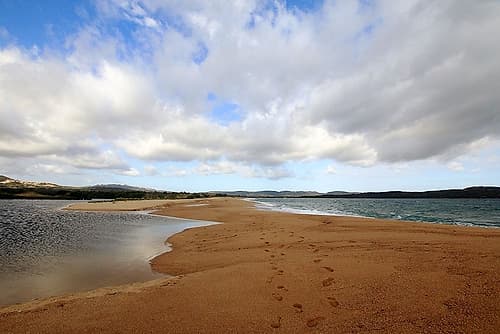 Spit of land in the sea in a cloudy day Coastal Print