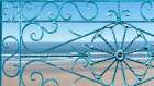 Ocean Through Wrought Iron Window Art Print