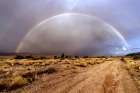 Rainbow across a dirt road Antares in northwestern Arizona Art Print