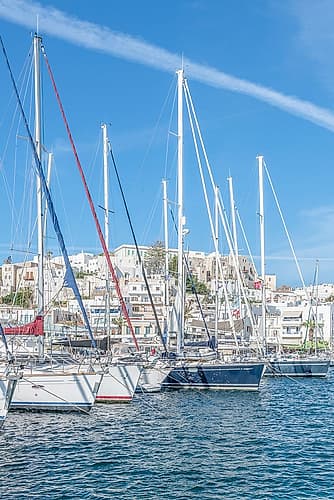 Naxos Harbor Through Sailboat Masts Art Print