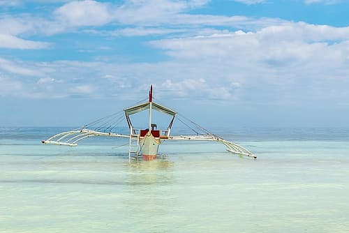 Outrigger Boat in Turquoise Water III Art Print