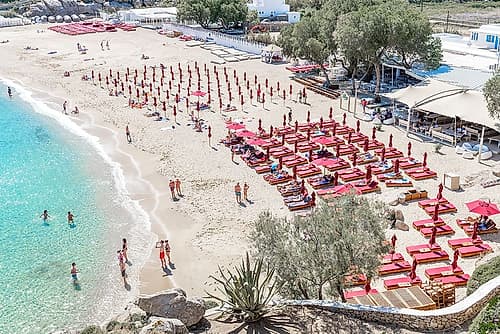 Greek Island Beach with Red Umbrellas Art Print